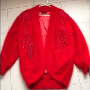 Beautiful red angora lined jacket. Also in black.